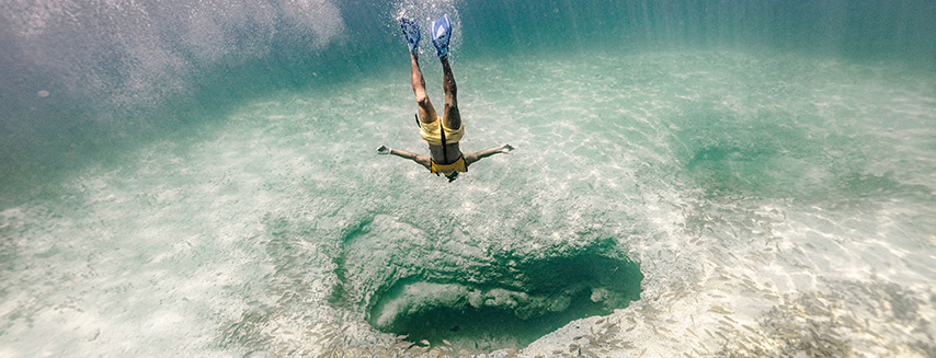 Jump and immerse into the beautiful caribbean water